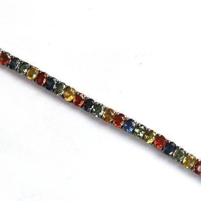 BRACELET articulé en argent (925°/°°) serti...