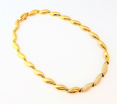 COLLIER en or jaune 18k (750/°°) composé...