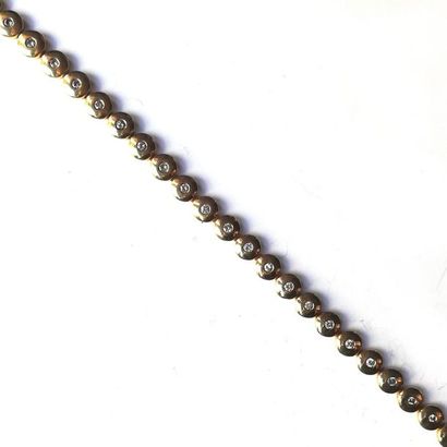 BRACELET en or jaune 18K (750°/°°) à maillons...