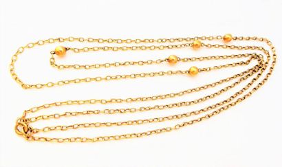 SAUTOIR en or jaune 18K (750/°°), double...