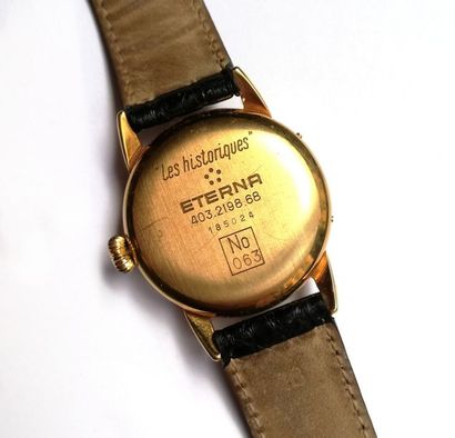 ETERNA - Montre chronographe en or jaune...