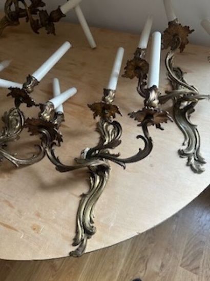 1 lot comprising a suite of four metal three-arm...