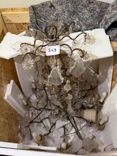 In a case: 1 large chandelier in a brass...