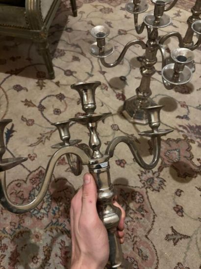 Important lot of metal candlesticks and candlesticks...
