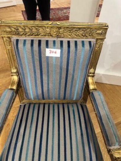 Pair of flat-back armchairs in carved and...