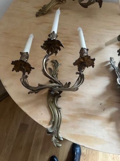 1 lot comprising a suite of four metal three-arm...