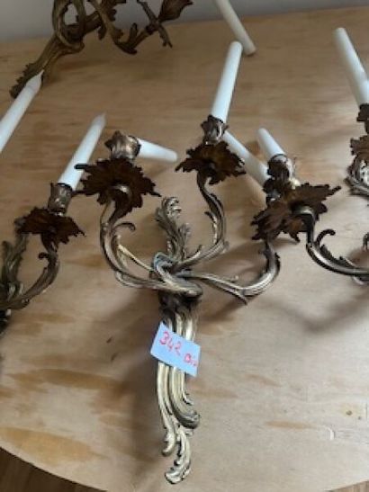 1 lot comprising a suite of four metal three-arm...