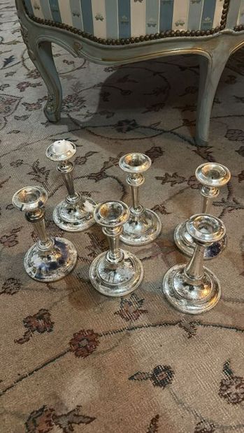 Important lot of metal candlesticks and candlesticks...