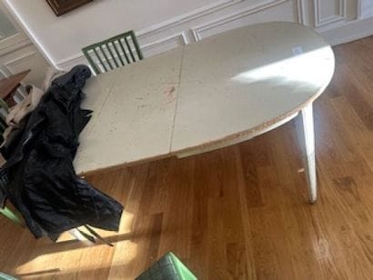 1 oval table with one extension in damaged...