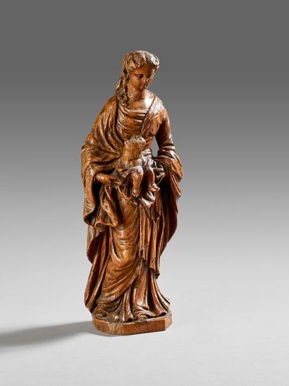 Vierge à l'enfant en bois sculpté.
Fin XVII,...