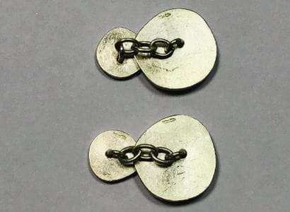 Paire de boutons de manchette en argent,...