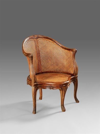 Fauteuil de bureau en bois sculpté et mouluré...