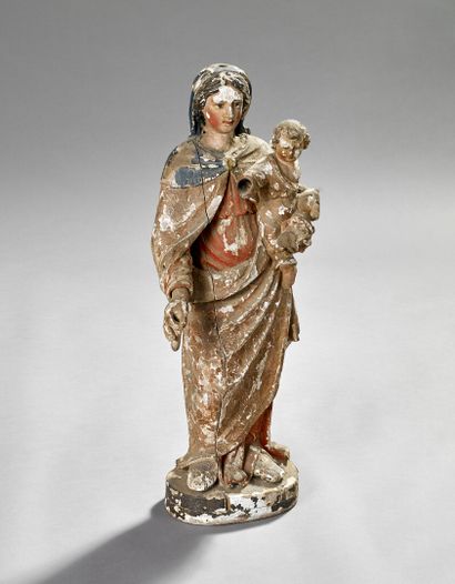 Vierge à l'Enfant sculptée en bois, à décor...