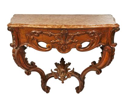 Console en bois naturel mouluré et sculpté...