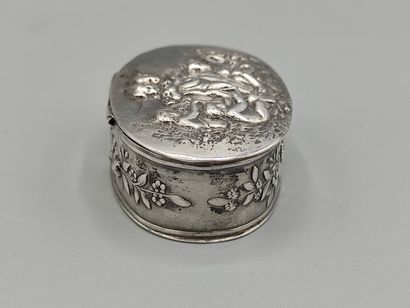 Oval silver box decorated on the lid with...