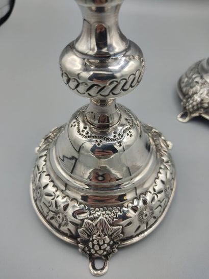 LONDON 1918

Pair of silver torches decorated...