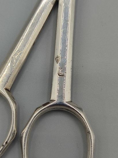 Original silver sugar tongs in the form of...
