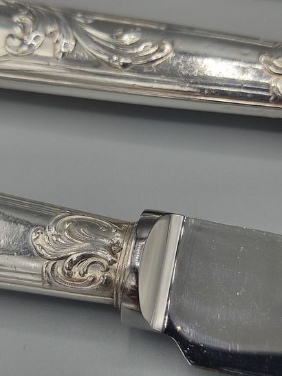 
Service of table knives (12) with handles...