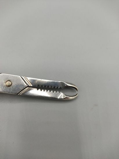 Original silver sugar tongs in the form of...