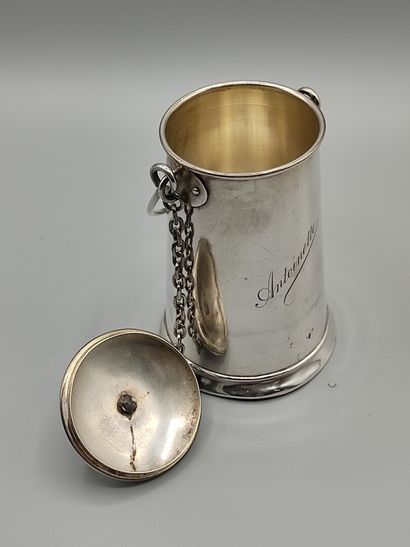 Silver milk jug with a handle.

Lid attached...