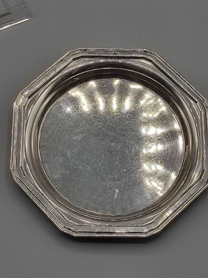 Pair of octagonal silver coasters.

Minerve...