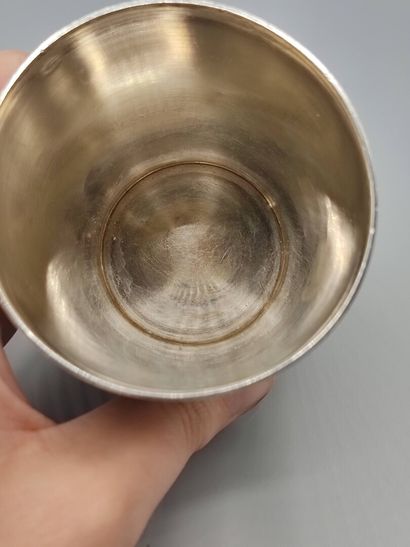 Silver tumbler of plain model. 

Large frieze...