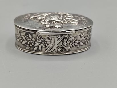 Oval silver box decorated on the lid with...