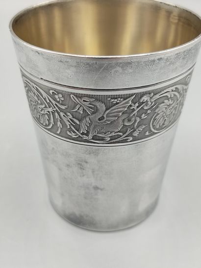 Silver tumbler of plain model. 

Large frieze...
