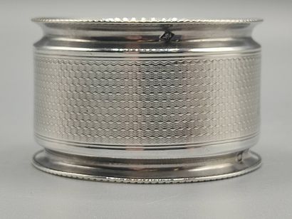 Silver napkin ring with guilloche decoration

Cartouche...