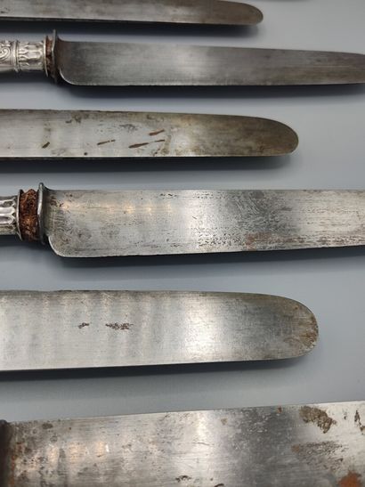 
Large table knife set (11) with silver handles...