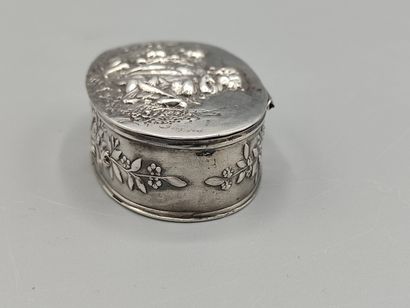 Oval silver box decorated on the lid with...