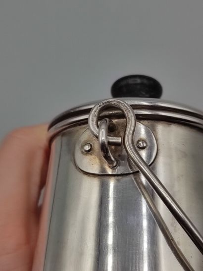 Silver milk jug with a handle.

Lid attached...