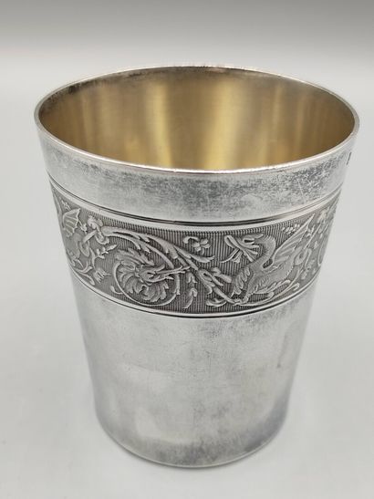 Silver tumbler of plain model. 

Large frieze...