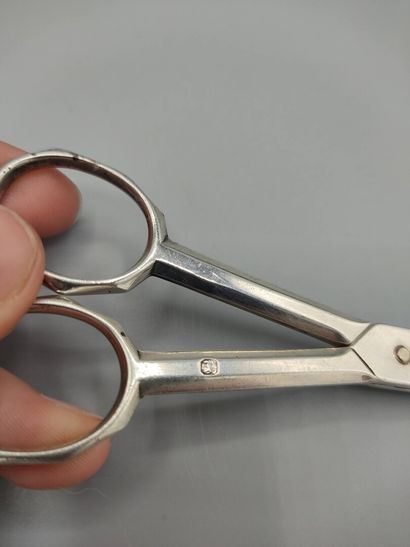 Original silver sugar tongs in the form of...