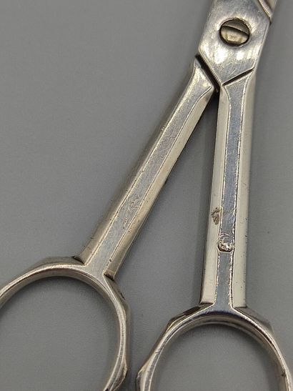 Original silver sugar tongs in the form of...