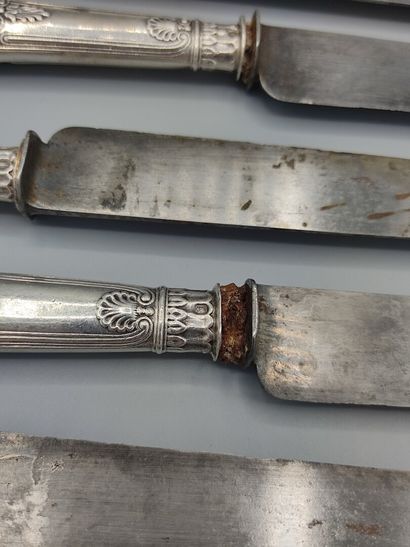 
Large table knife set (11) with silver handles...