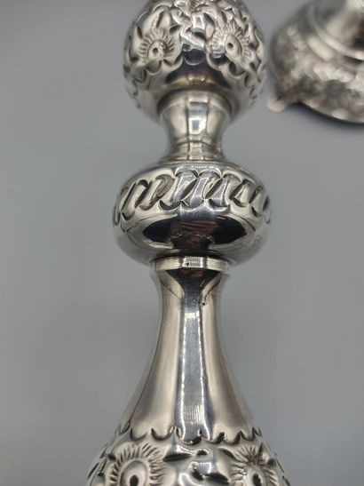 LONDON 1918

Pair of silver torches decorated...