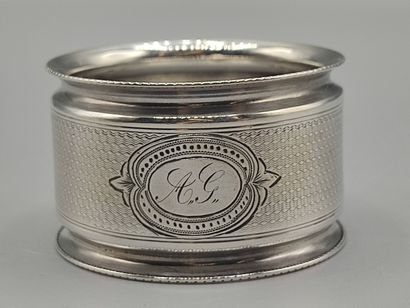 Silver napkin ring with guilloche decoration

Cartouche...