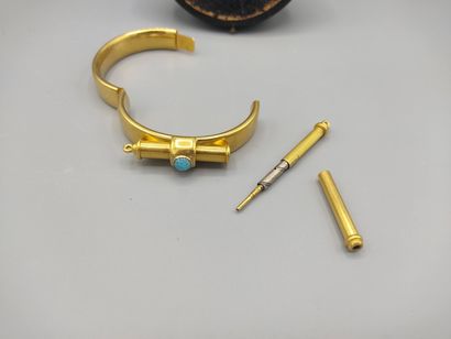 Rigid bracelet in 18KT gold set with a turquoise...