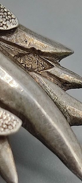 Pair of decorative silver elements (melted...