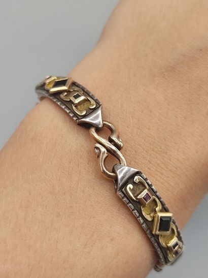 Yellow gold and silver bracelet with geometrical...