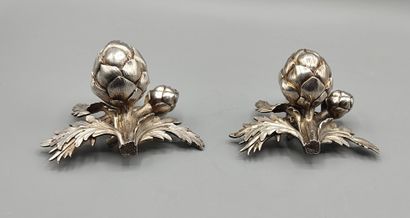 Pair of decorative silver elements (melted...