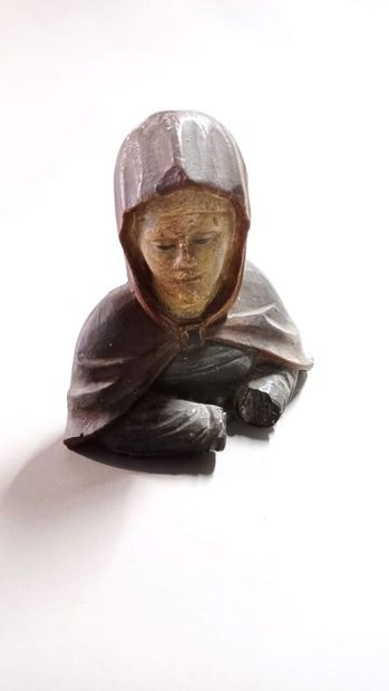 Bust of Holy Woman.

Carved polychrome wood...