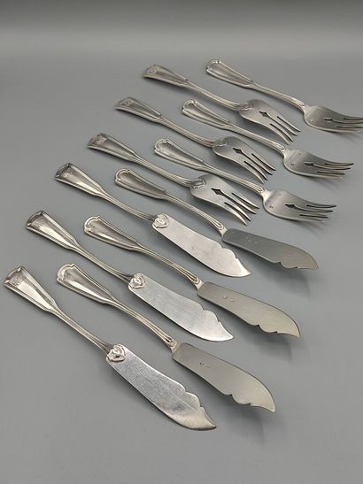 Silver fish service with six pieces of cutlery.

Spatulas...