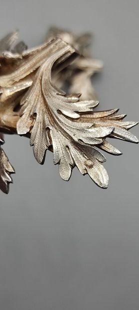 Pair of decorative silver elements (melted...