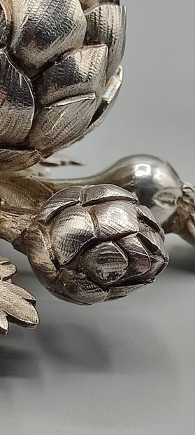 Pair of decorative silver elements (melted...