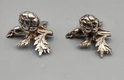 Pair of decorative silver elements (melted...