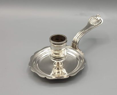 BOIN TABURET 

Candlestick with hand resting...