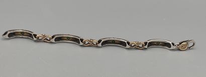 Yellow gold and silver bracelet with geometrical...