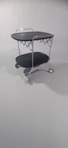 KARTELL publisher. 

Serving table with wheels,...